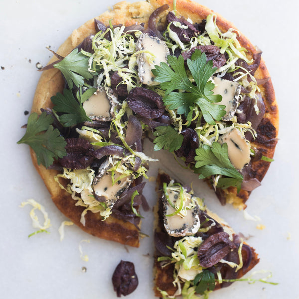 Socca Flatbreads with Caramelised Onions, Brussels Sprouts & Hummus