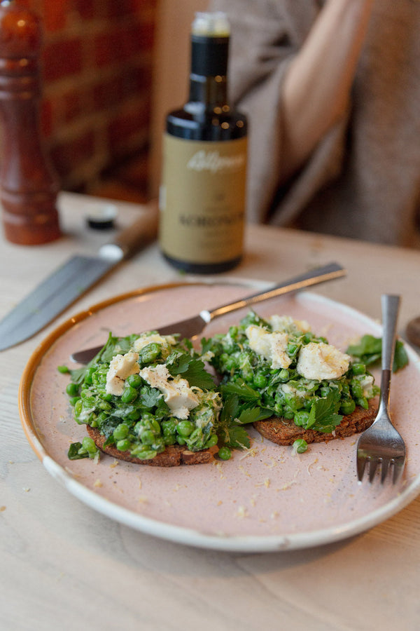 Peas, Casheta, & Herbs on Buckwheat Toast